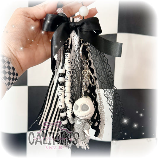 Jack tassel purse charm